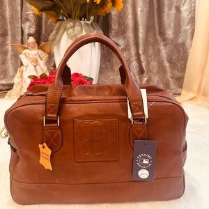 Boston Red Sox Genuine Leather Travel Bag w/ Trolley slip sleeve.